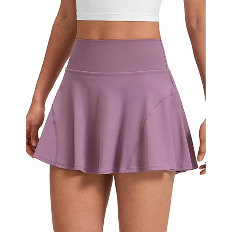 Women's soft and flowing pleated tennis skirt with inner shorts and side pockets